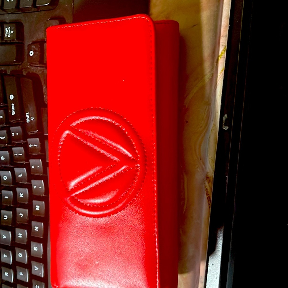 Beautiful, red wallet, clutch purse Valentino with Credit Card departments.